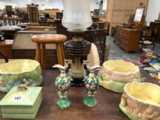 A VICTORIAN OIL LAMP, A PAIR OF PORCELAIN EWER, AND THREE SYLVAC BOWLS AND A BUTTER DISH.