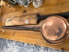 A VINTAGE CRICKET BAT AND A WARMING PAN.