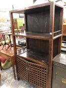 AN ORIENTAL HARDWOOD TALL SHELVED CABINET.