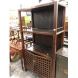 AN ORIENTAL HARDWOOD TALL SHELVED CABINET.