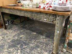 AN INTERESTING IRON FRAMED INDUSTRIAL PINE TOPPED SCULLERY TABLE.