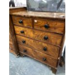 A VICTORIAN MAHOGANY CHEST OF DRAWERS.