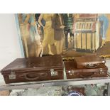 A LEATHER SUITCASE AND TWO ATTACHE CASES,