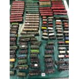 A GOOD COLLECTION OF TT GAUGE LOCOMOTIVES, CARRIAGES AND ROLLING STOCK.