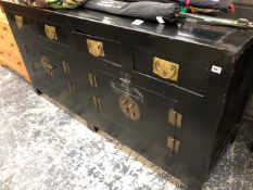 A LARGE ORIENTAL EBONISED SIDE BOARD.