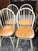 A SET OF FOUR KITCHEN CHAIRS.