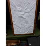 AN OAK FRAMED ARTS AND CRAFTS STUDIO PLASTER COMPOSITION OF TWO BOXING HARES BEARING THE ARTISTS