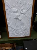 AN OAK FRAMED ARTS AND CRAFTS STUDIO PLASTER COMPOSITION OF TWO BOXING HARES BEARING THE ARTISTS