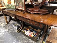 A NEAR PAIR OF MAHOGANY SOFA TABLES.