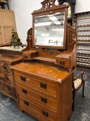 AN EDWARDIAN SATIN WALNUT DRESSING CHEST.