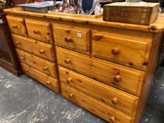 A PINE MULTI DRAWER SIDE UNIT.