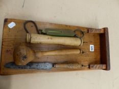 A PINE FISHERMANS WALL MOUNTED SET OF FOUR TOOLS