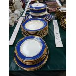 A BOOTHS POWDER BLUE AND GILT PART DINNER SERVICE