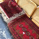 THREE VINTAGE EASTERN SMALL RUGS.