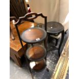 A FOLDING CAKE STAND, A LARGE EASTERN BRASS TRAY AND AN ORIENTAL POT STAND.