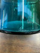 A SIGNED BLUE ART GLASS VASE.