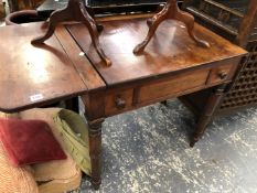 A VICTORIAN MAHOGANY WRITING TABLE.