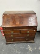 A 19th C. OAK BUREAU ON STAND.