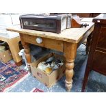 A PINE TABLE, THE RECTANGULAR TOP ABOVE TWO END DRAWERS, THE BALUSTER LEGS ON SPINDLE FEET. W 138