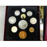 CASED COIN SETS, LOOSE GB AND WORLD COINAGE, AND A COIN COLLECTORS ALBUM WITH PART CONTENTS.