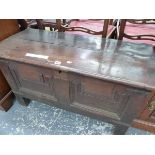 AN 18th C. AND LATER OAK COFFER WITH TWIN PANELLED FRONT AND INTERIOR CANDLE BOX. W 99cms.