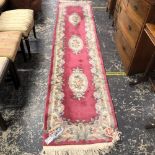 A CHINESE AUBUSSON DESIGN RUNNER. 315 x 71cms