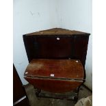 AN OAK CORNER CABINET AND AN OCCASIONAL TABLE.