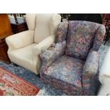 TWO WING ARMCHAIRS, ONE UPHOLSTERED IN FLORAL MATERIAL THE OTHER IN BEIGE