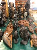 A COLLECTION OF AFRICAN AND FAR EASTERN CARVED FIGURES.