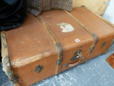 A BROWN LEATHERETTE COVERED CABIN TRUNK