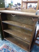 AN EARLY 20th C. OAK OPE BOOKCASE WITH TWO ADJUSTABLE SHELVES. W 106 x D 27 x H 118cms TOGETHER WITH