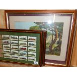 TWO FRAMED GROUPS OF CIGARETTE CARDS OF STEAM ENGINES, TOGETHER WITH A LANDSCAPE PRINT