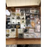 AN INTERESTING COLLECTION OF ROCKS, FOSSILS AND MINERALS INCLUDING POLISHED EXAMPLES IN DISPLAY