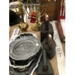 THREE ANTIQUE IRONS, A MENORAH, BRASS JUG, PEWTER PLATES ETC.