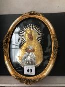 A FRAMED ICON OF THE VIRGIN MARY WITH GILT AND SILVER RIZA.