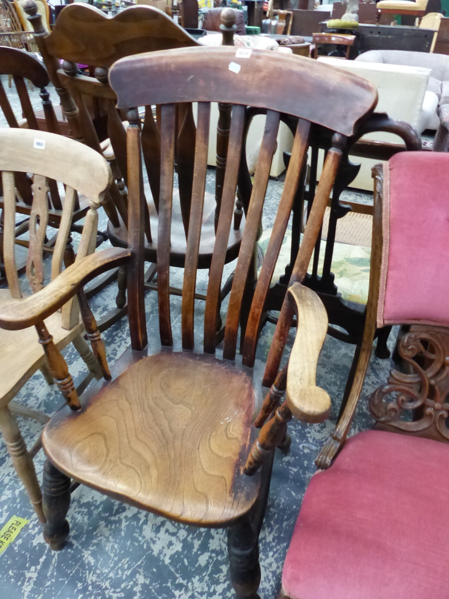 A 19th C. SADDLE SEATED ELBOW CHAIR WITH A CURVED TOP RAIL OVER THE FIVE BAR BACK