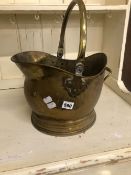 A BRASS COAL SCUTTLE.