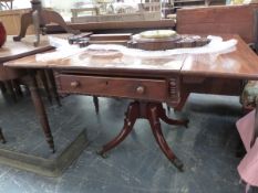 A VICTORIAN MAHOGANY PEMBROKE TABLE, THE RECTANGULAR FLAP TOP OVER A DRAWER, A TURNED COLUMN AND