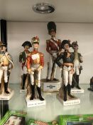 SIX VARIOUS DIE CAST MOUNTED MILITARY FIGURES, AND SIX PORCELAIN MILITARY FIGURES.