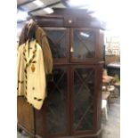 A 19th C. ASTRAGAL GLAZED FLOOR STANDING CORNER CUPBOARD, THE GLAZING BARS LINE INLAID. W 110 x D 55