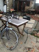 TEAK GARDEN TABLE AND TWO WROUGHT IRON CHAIRS