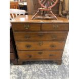 A GEORGIAN OAK CHEST OF TWO SHORT AND THREE GRADED LONG DRAWERS ON BRACKET FEET. W 93 x D 52.5 x H