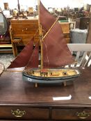 A VINTAGE MODEL SAILING BOAT.