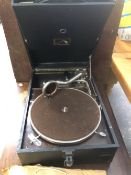 A VINTAGE HMV PORTABLE GRAMOPHONE AND VARIOUS RECORDS.