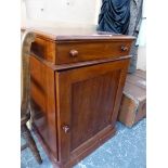 A MAHOGANY WASHSTAND CUPBOARD, THE LID OPENING ONTO A WASH BOWL RECEIVER ABOVE THE CUPBOARD AND