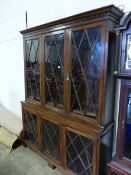 AN EDWARDIAN GLAZED BOOKCASE.