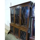 AN EDWARDIAN GLAZED BOOKCASE.