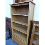 A 20th C. OAK OPEN BOOK CASE WITH FOUR SHELVES OVER TWO DRAWERS. W 86 x D 40 x H 181cms.