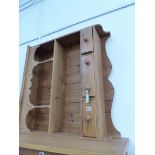 A PINE ENCLOSED DRESSER BACK, THE ARCADED TOP SHELF ABOVE ANOTHER SHELF AND THREE DRAWERS