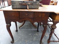 A GEORGE III OAK LOWBOY WITH THREE DRAWERS, A WAVY APRON, CABRIOLE LEGS AND POINTED PAD FEET. W 72.5